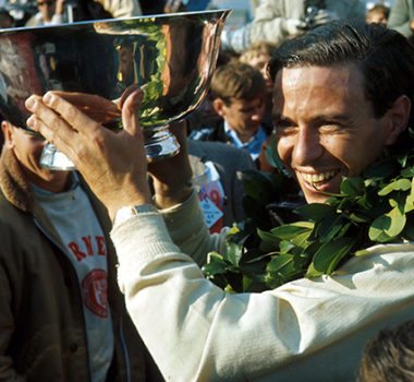 Jim Clark holding a trophy